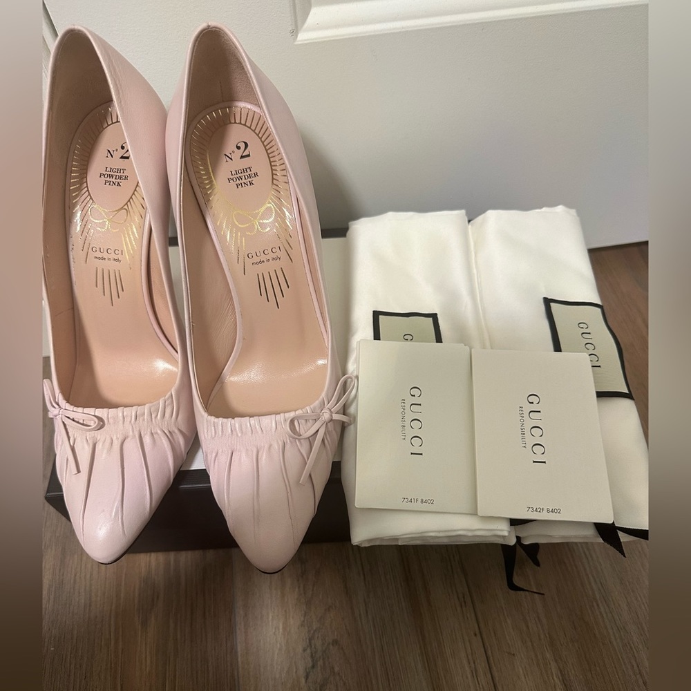 Gucci light powder pink heels.